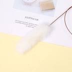 Textured fabric with 'A Little Lie' text on a white background